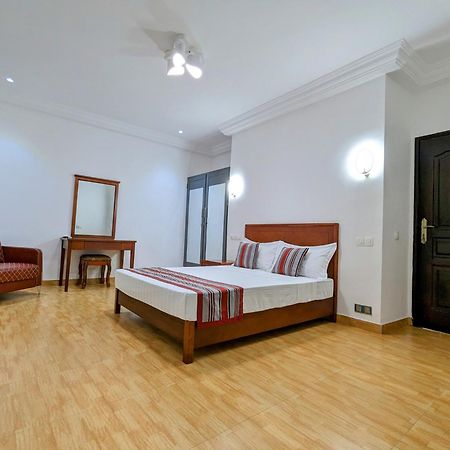 Les Ombrelles Appart'Hotel Cotonou Bagian luar foto